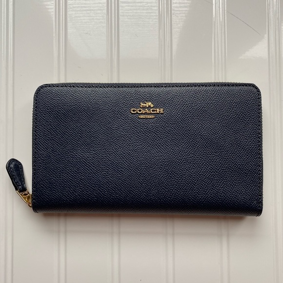Coach Handbags - NWT Coach Continental midnight blue wallet